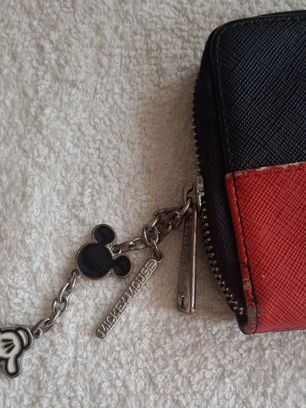 Disney Loungefly zip-around wallet featuring a white Mickey Mouse gloved hand